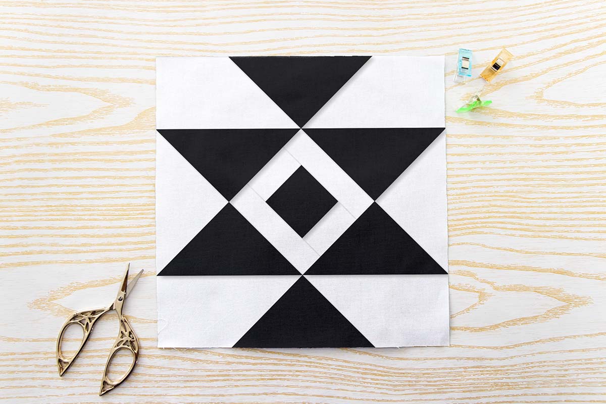 Aztec Hourglass Diamond FPP Quilt Block Pattern PDF - Black and White Geometric Quilt Block with Bold Hourglass Shape and White Framed Diamond Centre