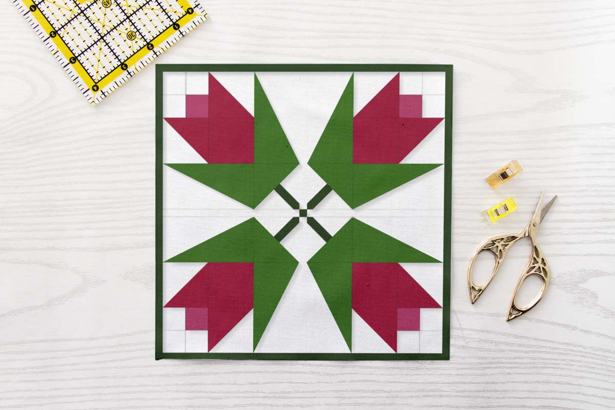 Tulip Table Topper FPP Pattern PDF - Four Red and Green Spring Flower Quilt Blocks with White Sashing and Green Centre Square